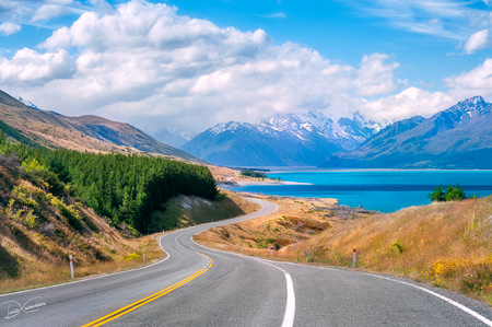 Breathtaking winding road along Lake Pukaki in Mount Cook NP, New Zealand