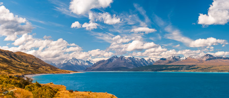 Breathtaking alpine scenery panorama at Lake Pukaki in Mount Cook NP, New Zealand.