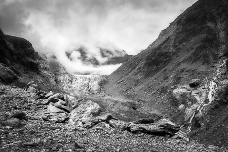 Dramatic view in black and white of Franz Josef Glacier in NZ.